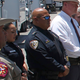 In this May 26, 2022, photo, Uvalde School Police Chief Pete Arredondo, third from left, stands during a news conference outside of the Robb Elementary school in Uvalde, Texas. Facing massive public pressure, Uvalde’s top school official has recommended the firing of the school district police chief who was central to the botched law enforcement response to the shooting at an elementary school that killed two teachers and 19 students.The city’s school board will consider firing Arrendondo at a special meeting Saturday, July 23, to consider the superintendent’s recommendation.